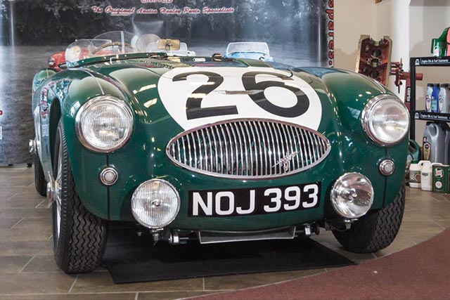 Austin Healey 100S Sebring on display in A H Spares showroom.