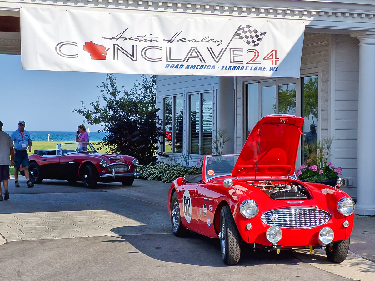 Conclave 24 - Concours judging - Austin Healey 100/6 parked underneath the Conclave 24 banner outside the Blue Harbor Resort in Wisconsin