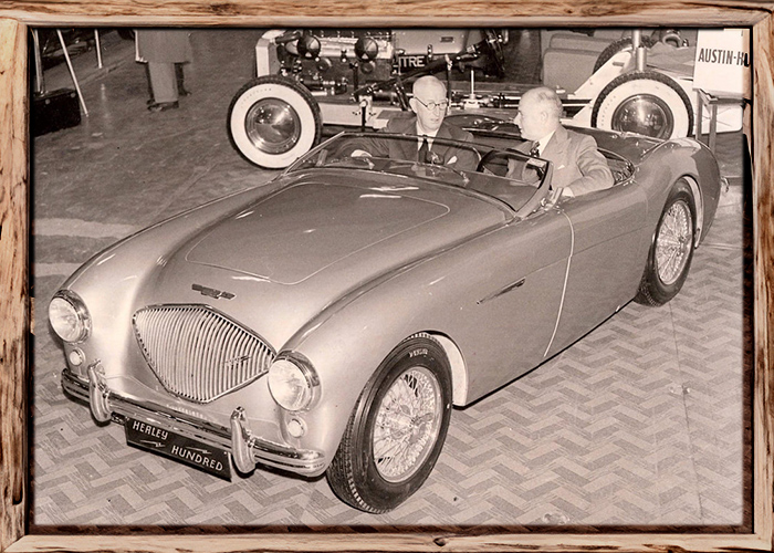 Donald Healey in his Austin Healey 100 at Earl's Court, London