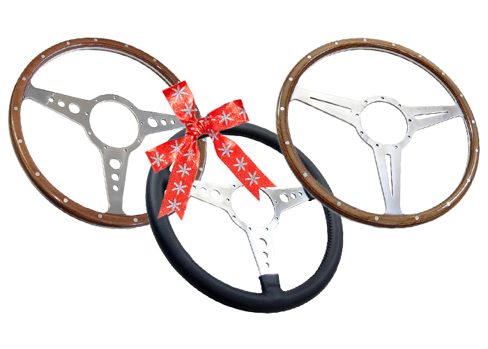 3 Moto-Lita steering wheels with Christmas present ribbon