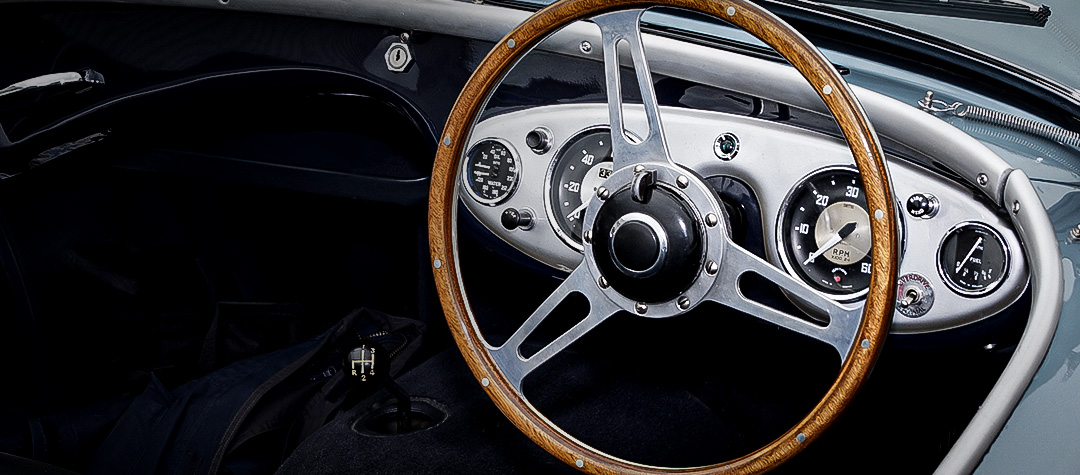 Derrington style Moto-Lita steering wheel in a blue Austin Healey 100-Six