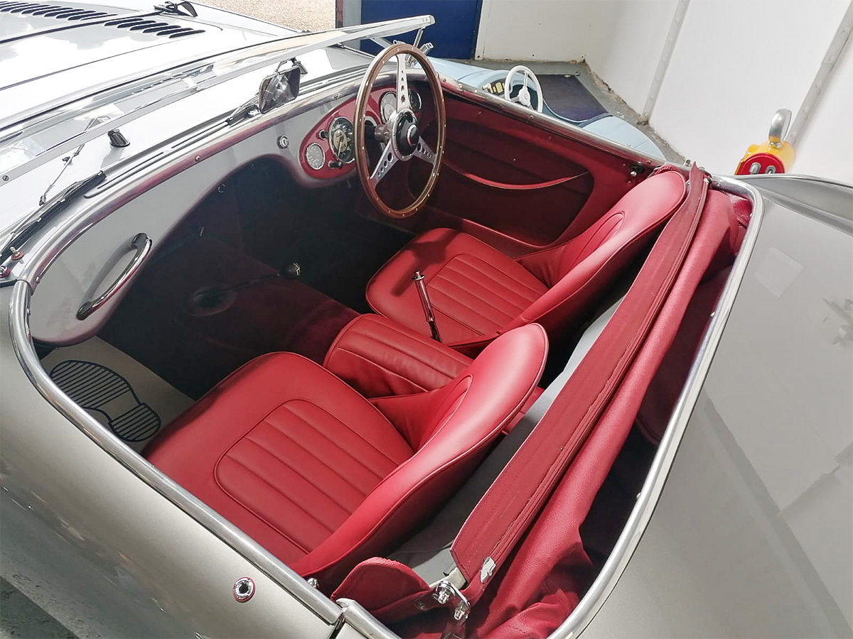 Red interior of an Austin Healey at Rawles Motorsport Open Day 2024